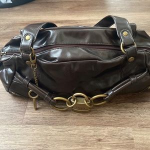 Never used with tags XOXO dark brown Keepsake handbag.